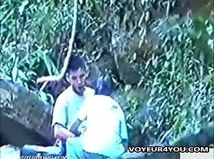 Horny asian couples sneak fuck in the forest