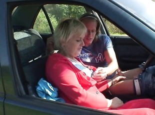 very hot blonde gilf gives sloppy head in the car