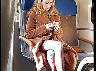Sexy pantyhose legs on train