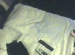 Lying on bed masturbating. Hidden camera