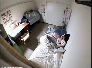 Japanese brunette gets filmed masturbating